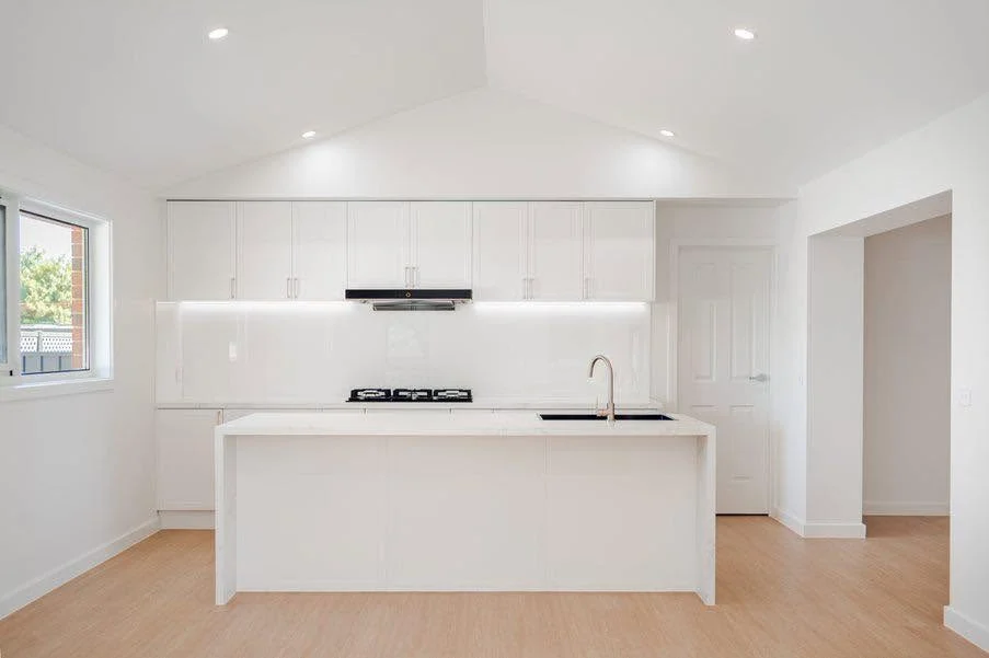 White kitchen with island